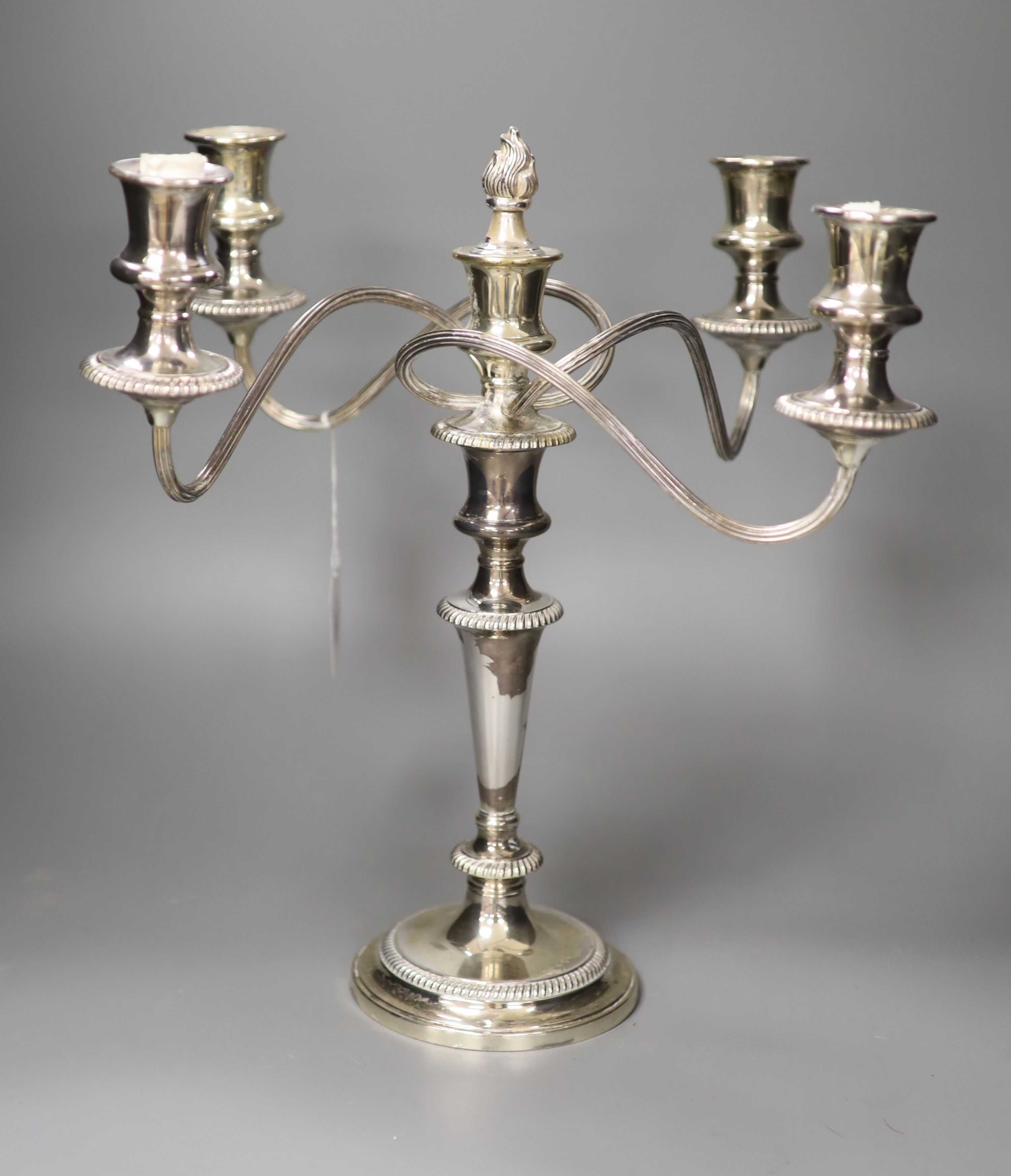 A silver plated four branch five light candelabrum, height 36cm